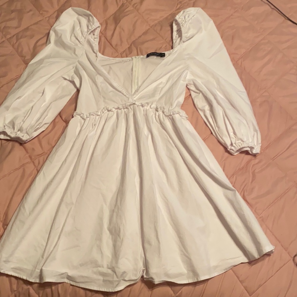 White deep cut V dress